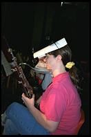 Loudoun Symphony Executive Directory (and principal bassoon) Cindy Hollister wearing a make-shift visor to block some overly-bright stage lights